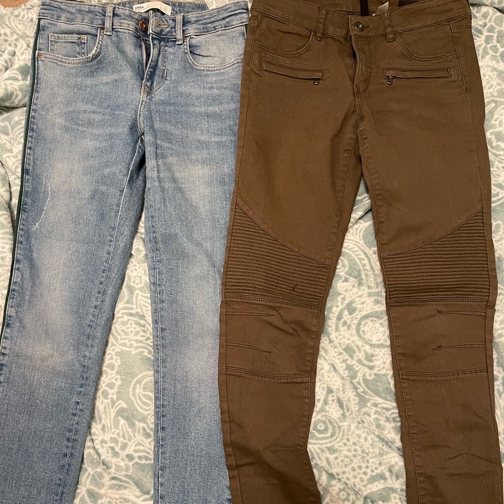 These are skinny jeans, a blue pair and a dark green pair.